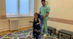 В Туле особенных детей учат правильно ходить с помощью экзоскелета