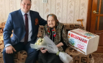 В Белевском районе ветерана поздравили песнями и парадом